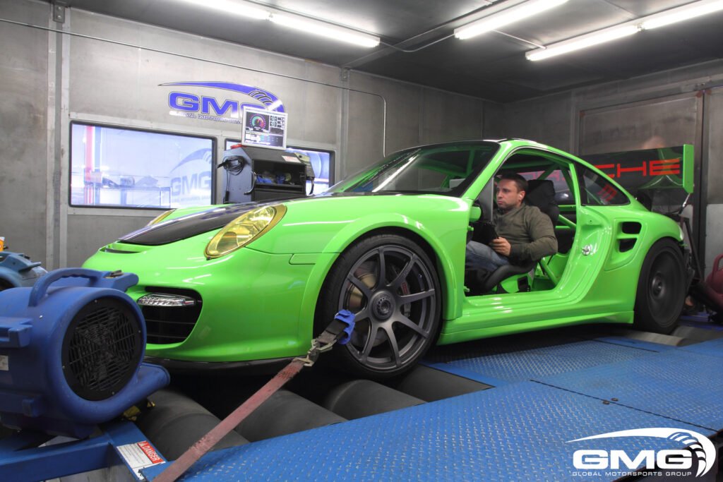 Green Porsche in a dynamo
