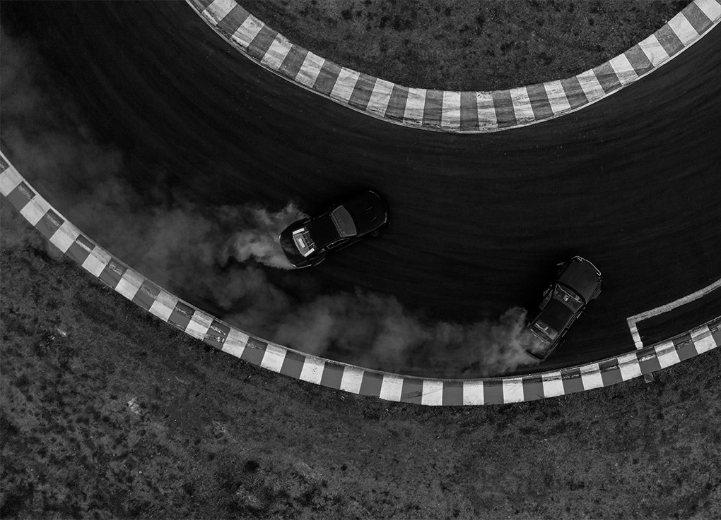 Two cars drifting